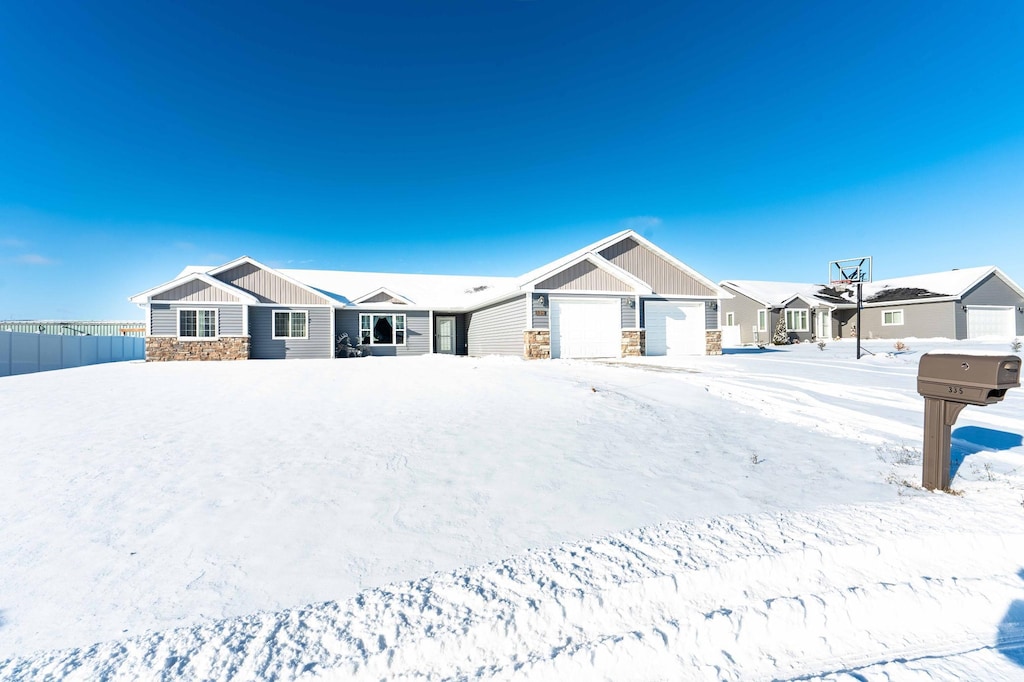 single story home featuring a garage