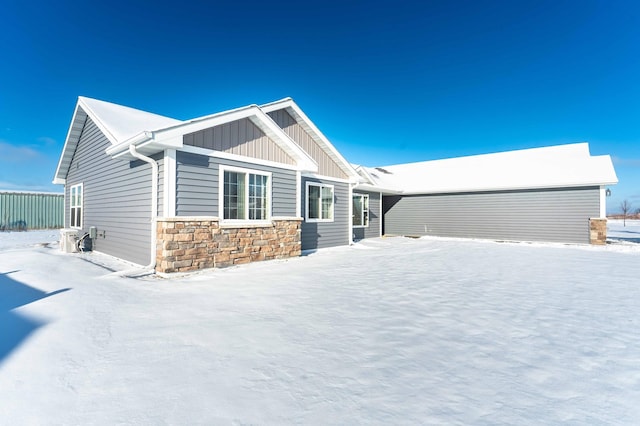 view of snow covered house