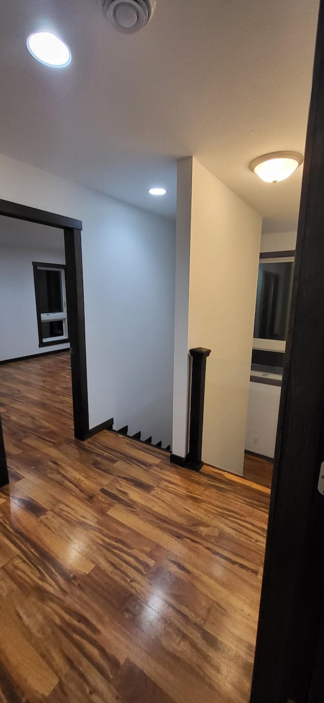 unfurnished room featuring dark hardwood / wood-style floors