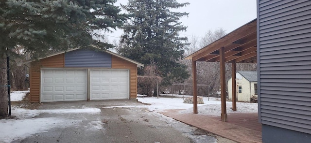 view of snow covered garage