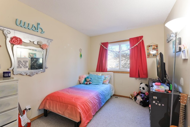 bedroom featuring carpet