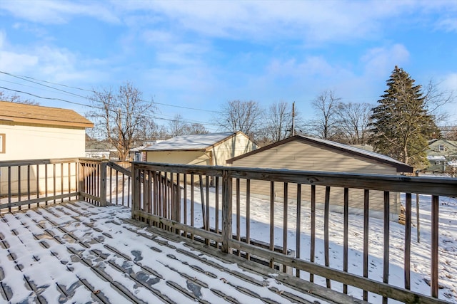 view of snow covered deck