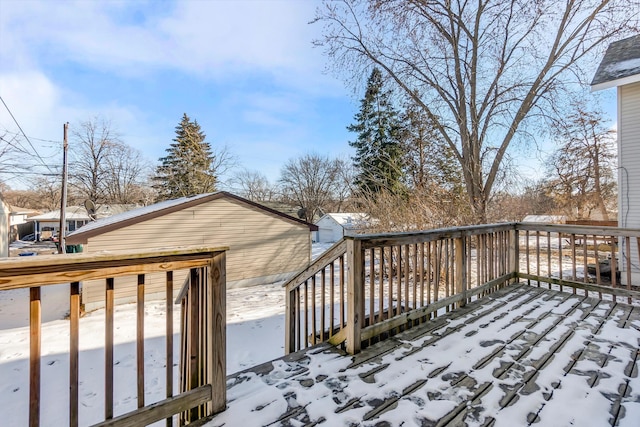 view of snow covered deck