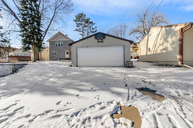 view of snow covered garage