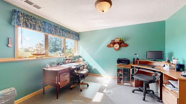 office area featuring a textured ceiling