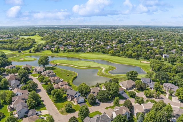 birds eye view of property featuring a residential view, a water view, and view of golf course