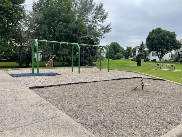 community jungle gym with a yard