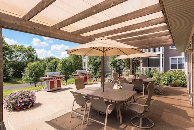 view of patio with a pergola and a grill