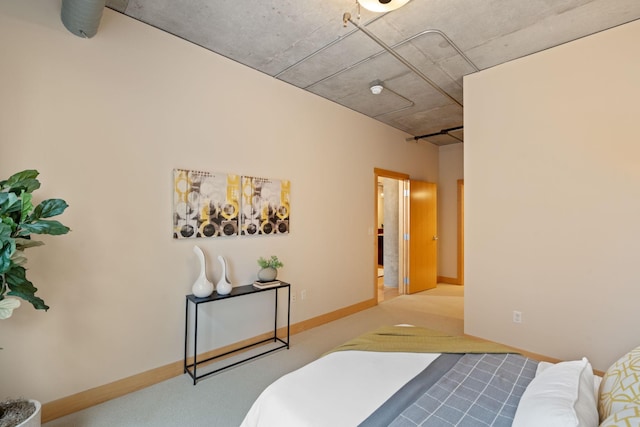 bedroom featuring light colored carpet