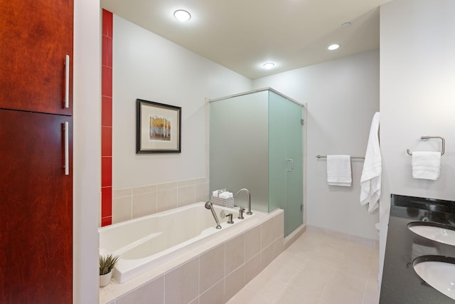 bathroom with vanity, shower with separate bathtub, and tile patterned flooring