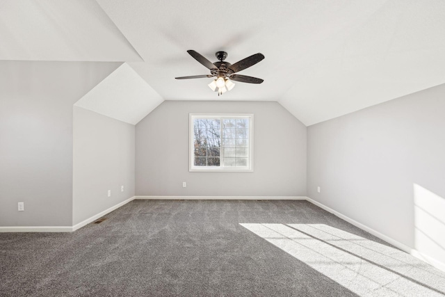 bonus room with carpet, ceiling fan, and vaulted ceiling