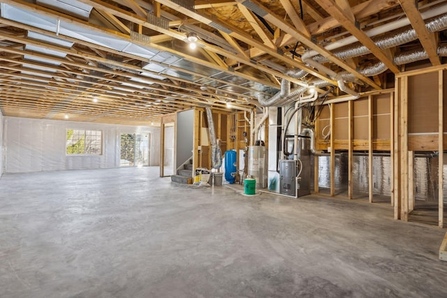 basement with heating unit and gas water heater