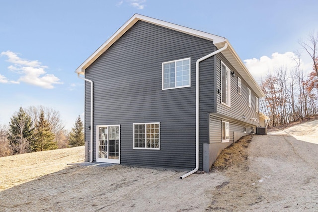 view of home's exterior featuring cooling unit