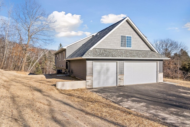 view of home's exterior featuring central AC