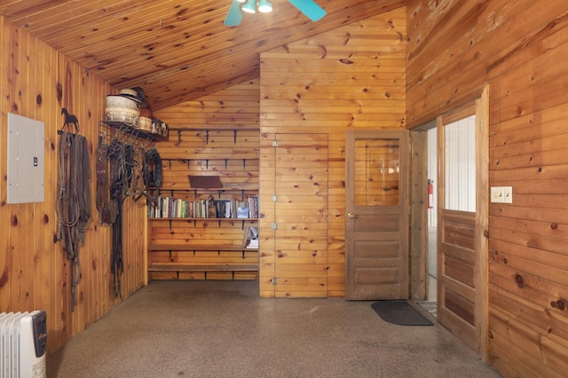 view of horse barn with electric panel and radiator heating unit