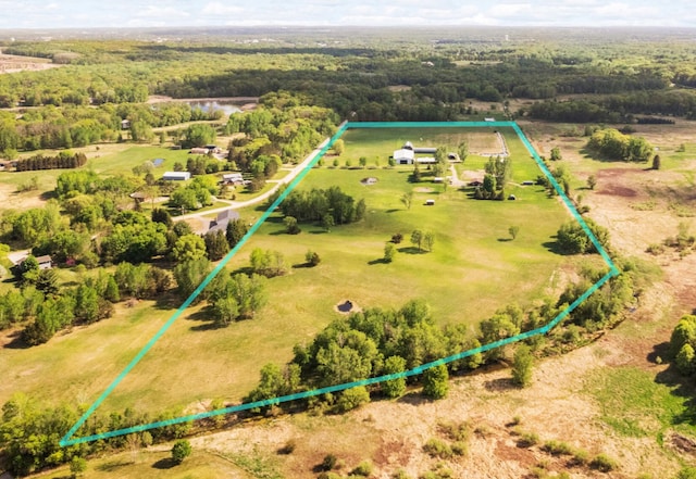 20842 Concord St NW, Elk River, MN 55330 - aerial view of property and surrounding area with property boundaries highlighted and a heavily wooded area