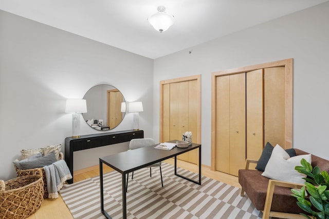 home office featuring hardwood / wood-style flooring