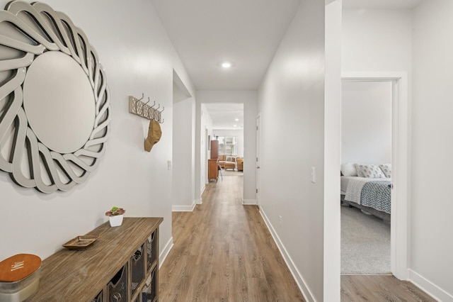 corridor featuring hardwood / wood-style floors