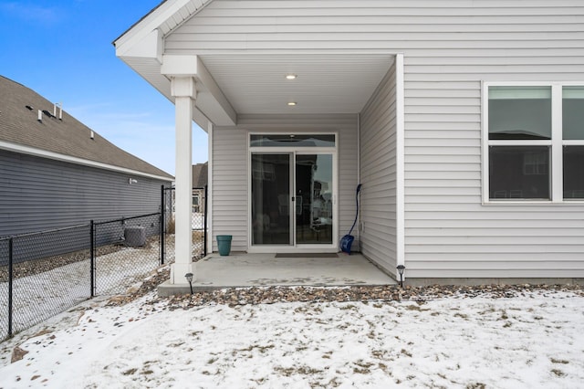 view of snow covered house