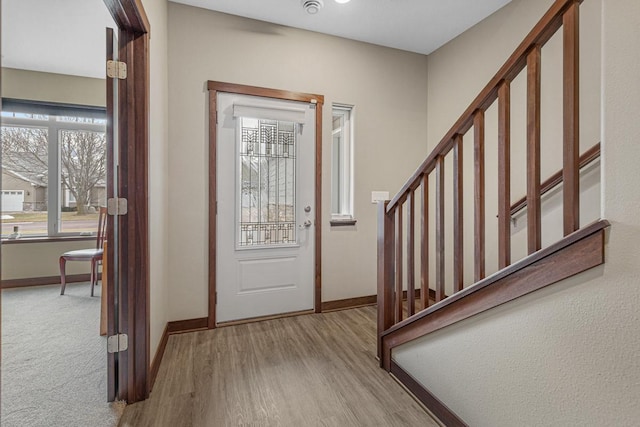 foyer entrance featuring light hardwood / wood-style flooring