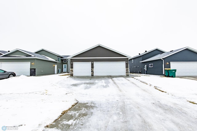 view of front facade with a garage and an outdoor structure