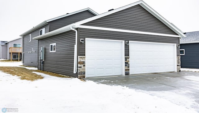 view of snow covered garage