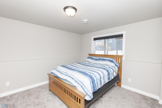 bedroom with light carpet