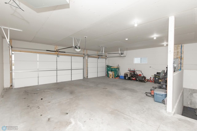 garage featuring a garage door opener