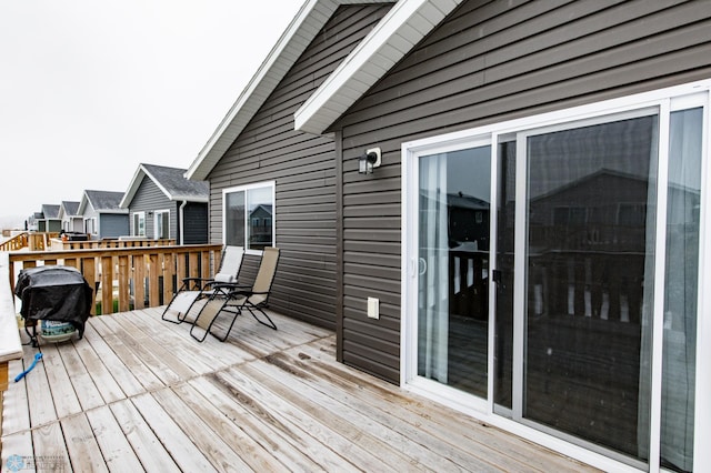 wooden terrace with grilling area