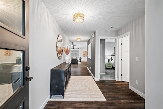 corridor featuring dark wood-type flooring