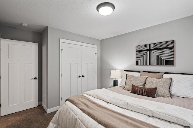 carpeted bedroom featuring a closet