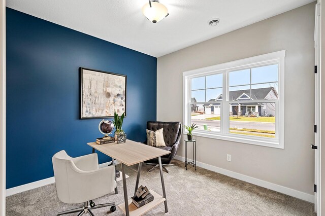 view of carpeted home office