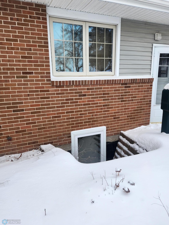 view of snow covered property