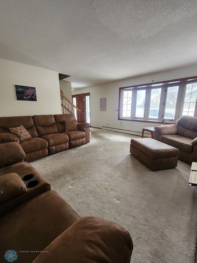 carpeted living room featuring a textured ceiling