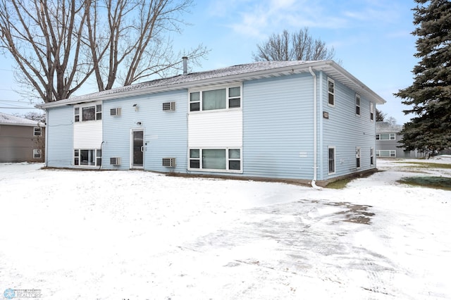 view of snow covered property