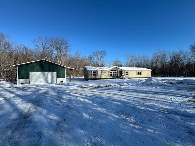 66156 County Road 132, Northome, MN 56661 - view of front facade with an outbuilding and a garage