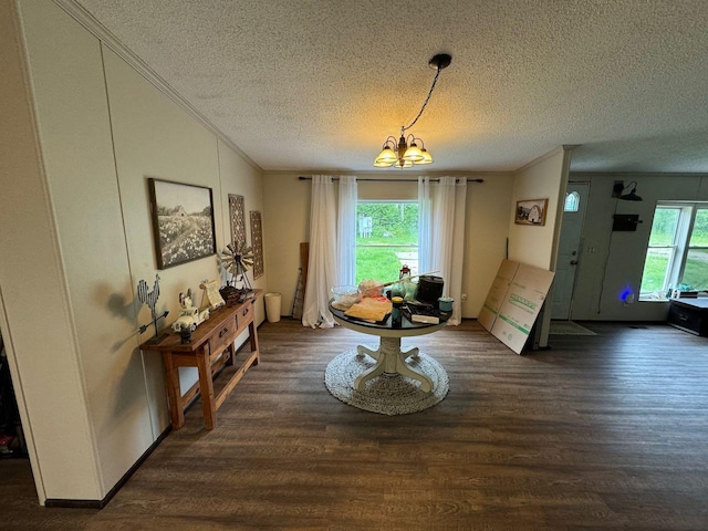 66156 County Road 132, Northome, MN 56661 - dining space featuring a notable chandelier, dark hardwood / wood-style flooring, and crown molding