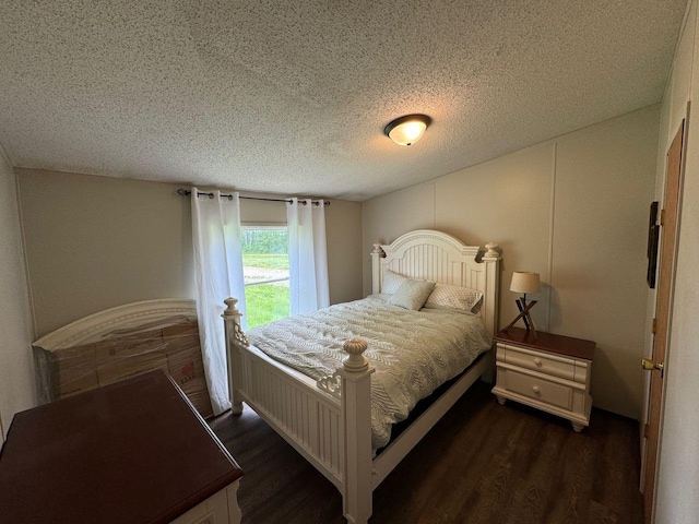 66156 County Road 132, Northome, MN 56661 - bedroom with dark hardwood / wood-style flooring and a textured ceiling