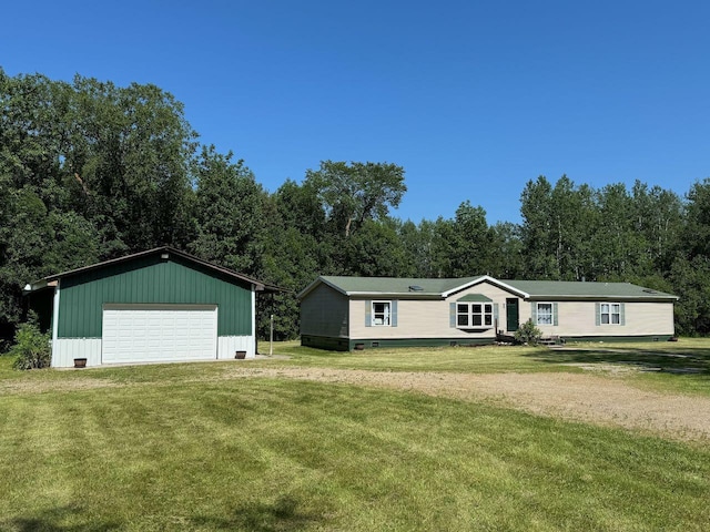 66156 County Road 132, Northome, MN 56661 - view of front of property with a front lawn, an outdoor structure, and a garage