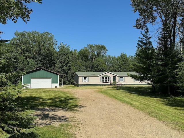66156 County Road 132, Northome, MN 56661 - ranch-style house with a garage, an outdoor structure, and a front lawn