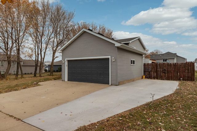 view of property exterior featuring a garage