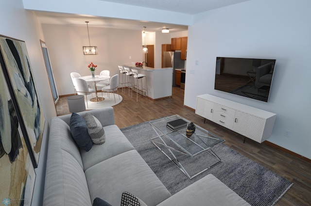 living room with dark wood-type flooring