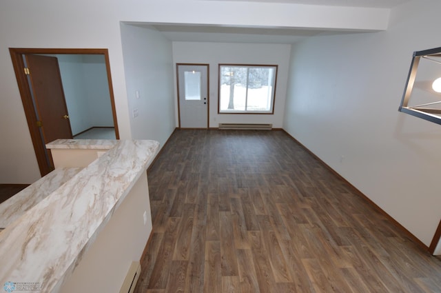 interior space featuring dark hardwood / wood-style flooring and a baseboard radiator