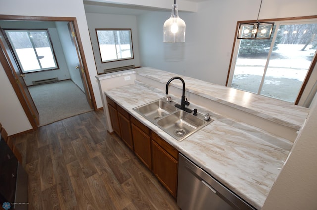 kitchen featuring dark hardwood / wood-style flooring, stainless steel dishwasher, sink, decorative light fixtures, and a baseboard radiator