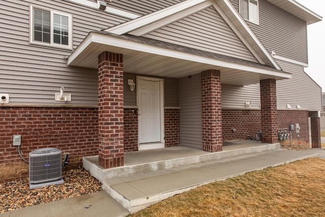 property entrance featuring central AC