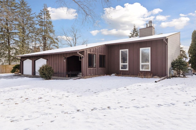 view of snow covered property