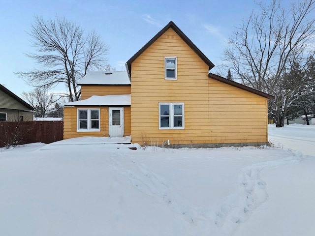 view of snow covered house