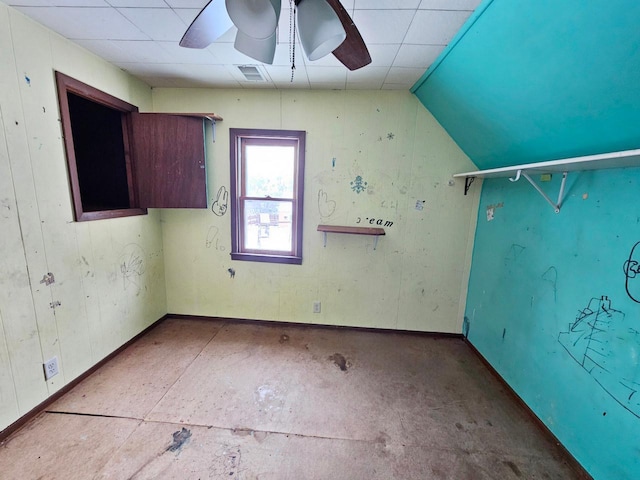 unfurnished room featuring ceiling fan and lofted ceiling