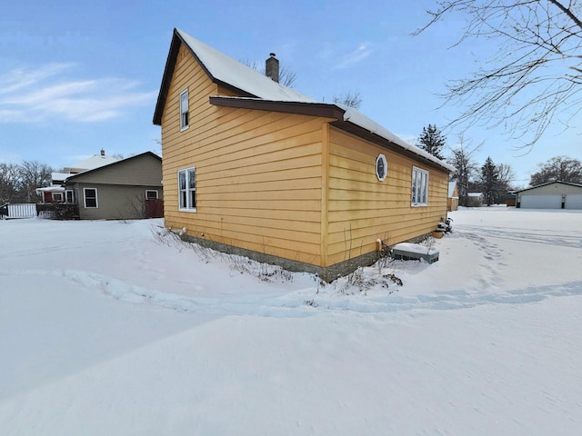 view of snow covered property