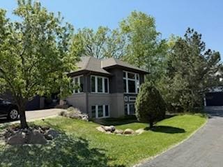 3529 Green Ridge Rd, Minnetonka, MN 55305 - view of front of house with a front yard